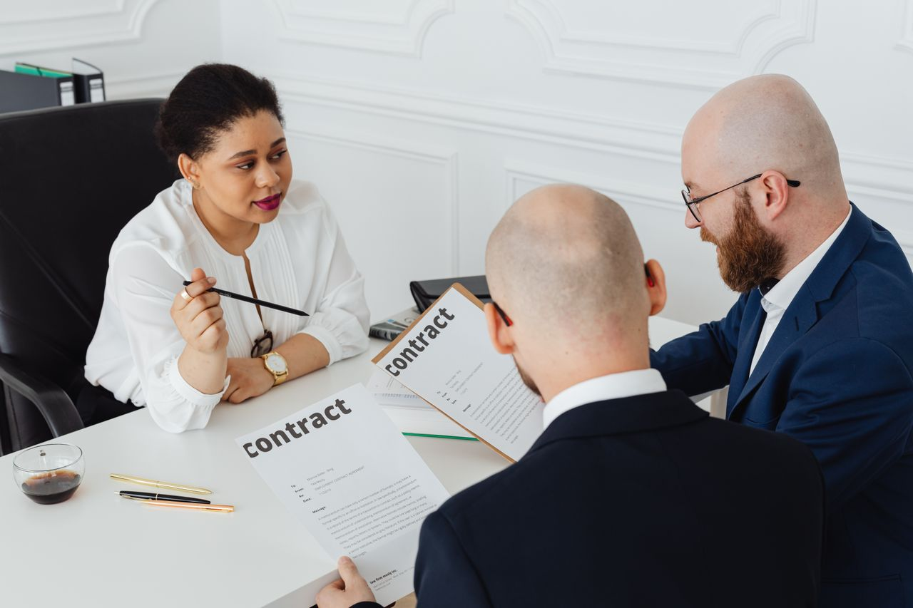 People reviewing a contract