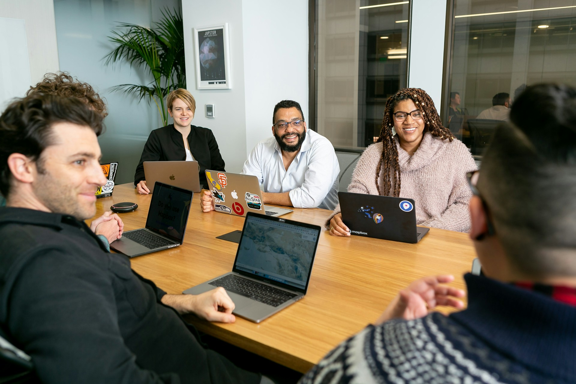 A group of people in a meeting