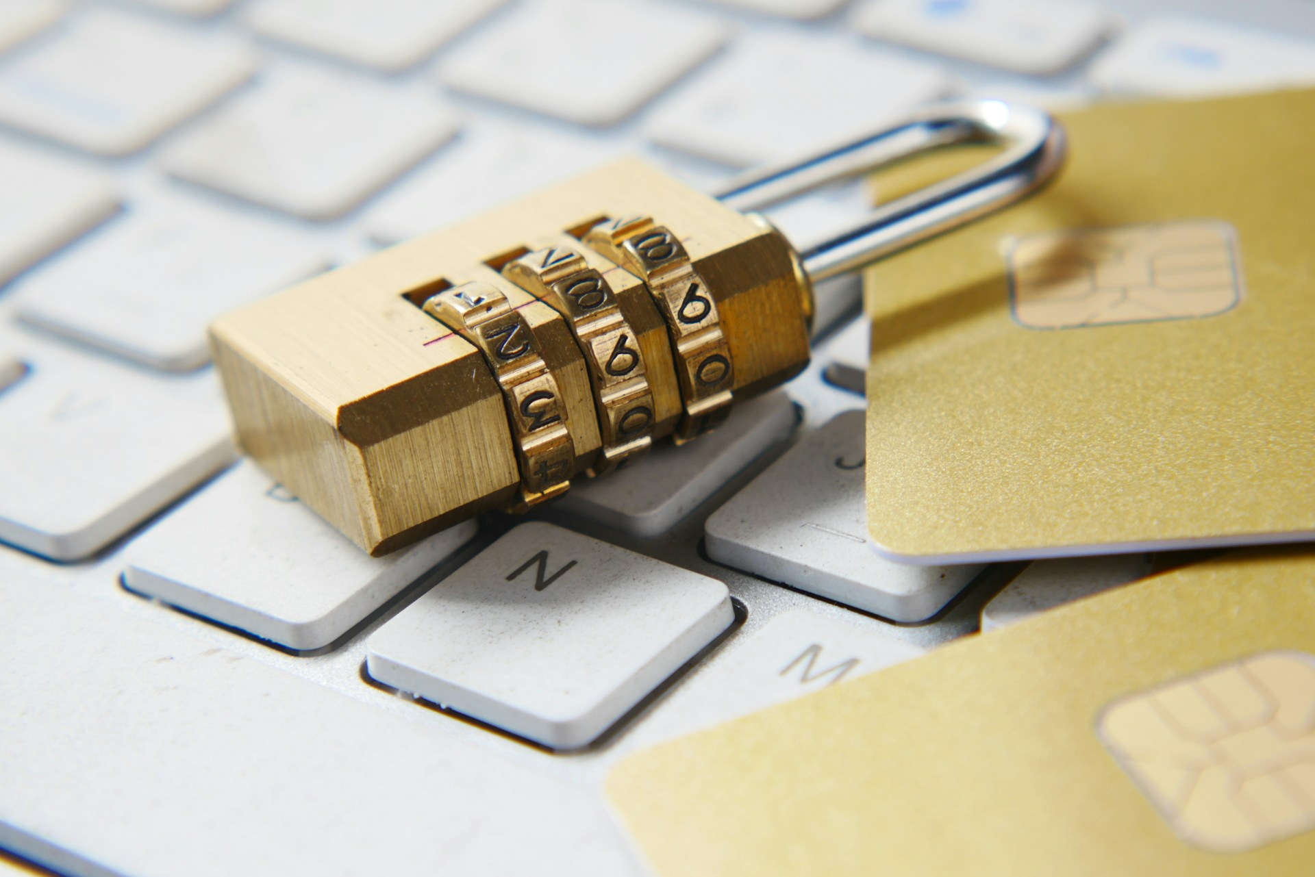 A photo of a lock and a close up of a keyboard