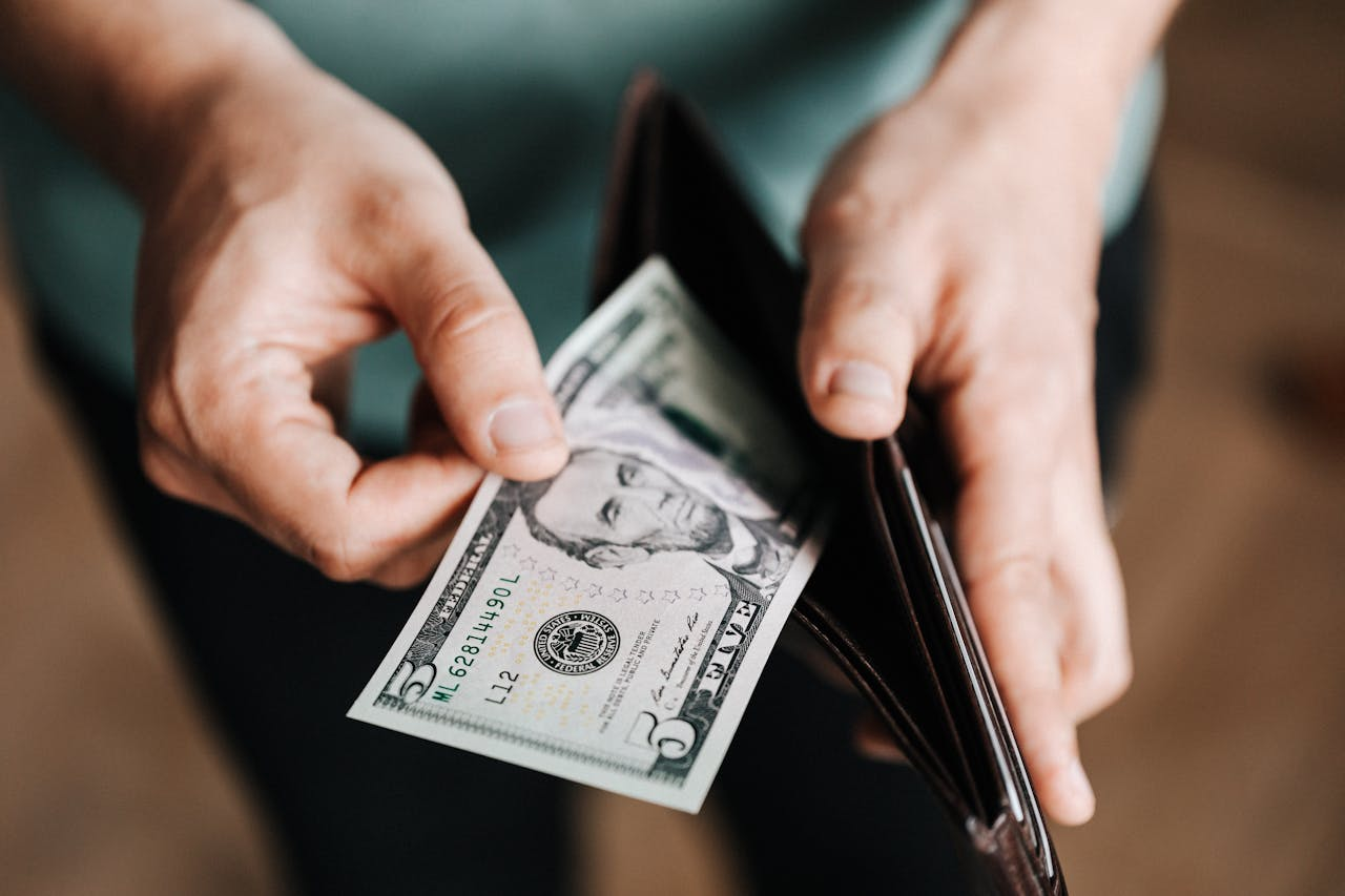 A wallet and a dollar