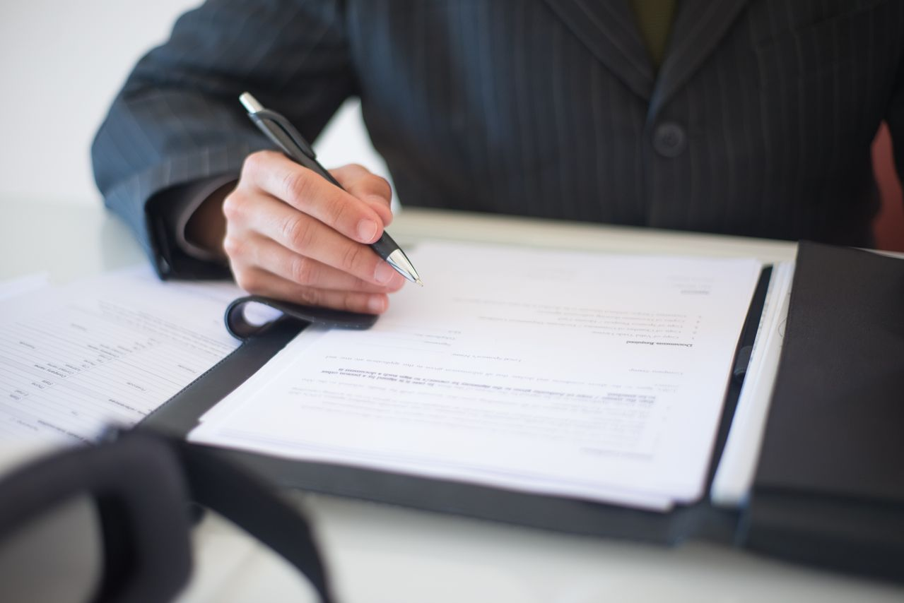 A person signing documents