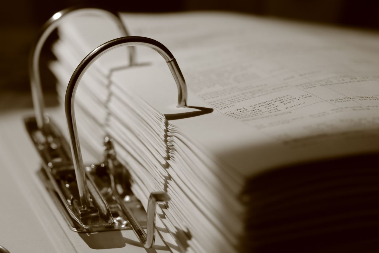 Close-up of a binder filled with documents