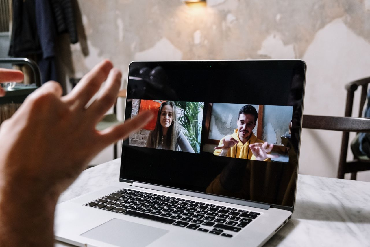 Close up of a laptop currently in video conferencing