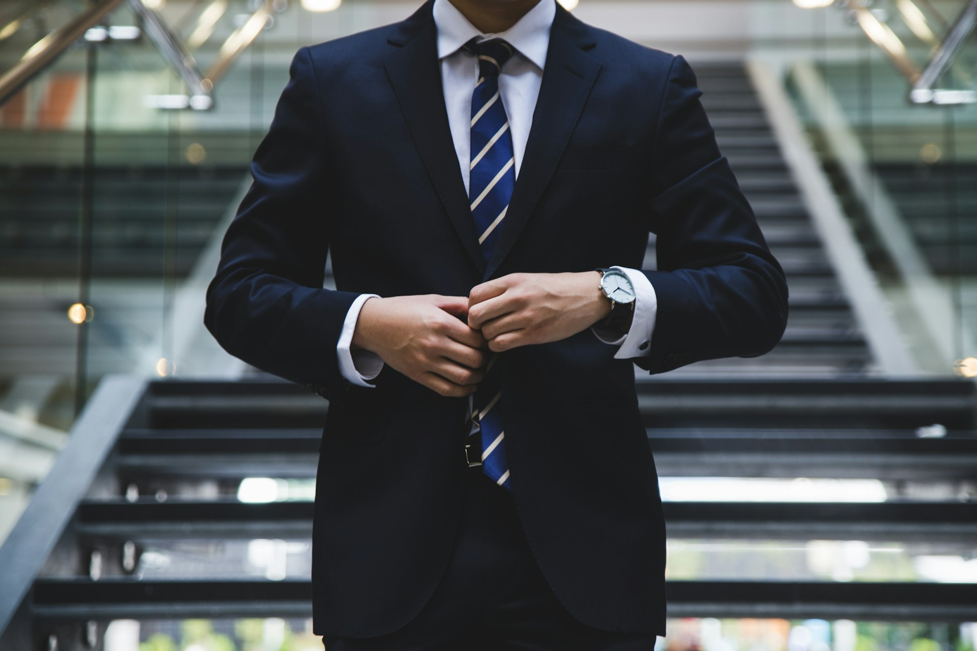 Man fixing his suit
