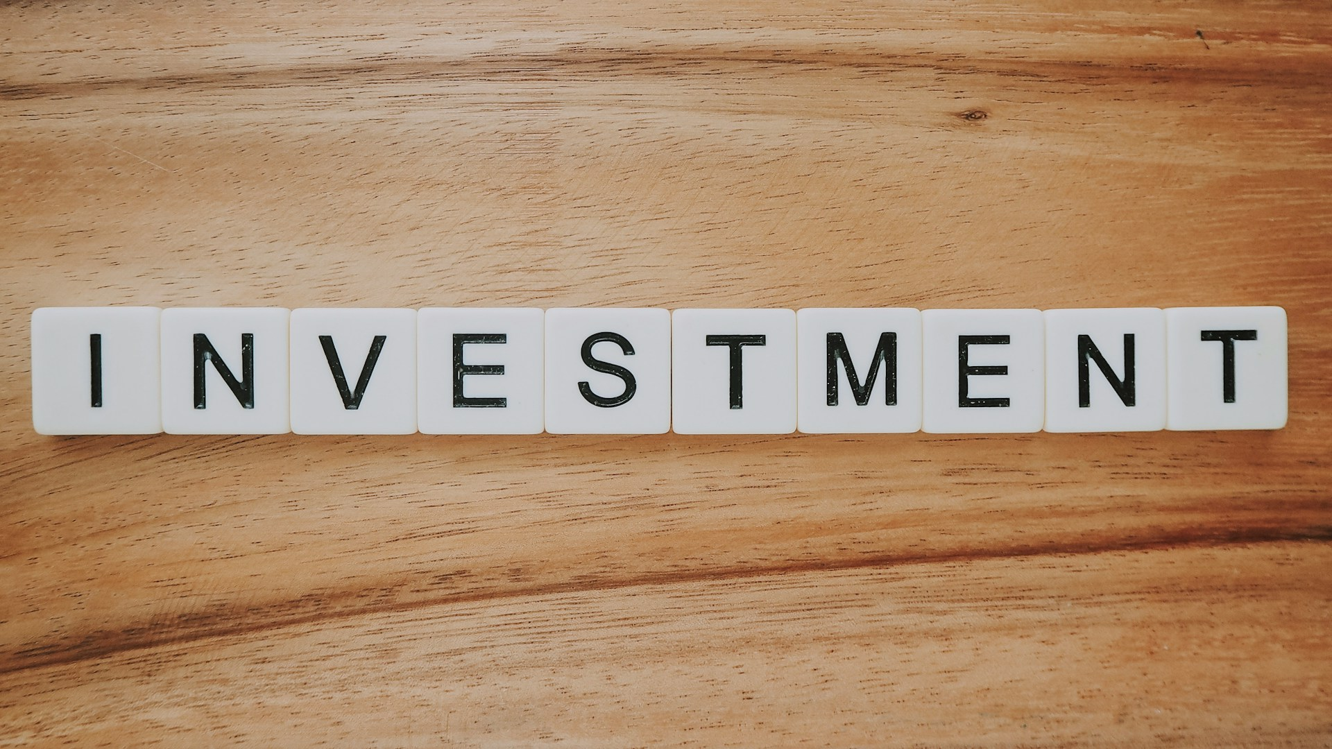 Text blocks spelling out the word INVESTMENT