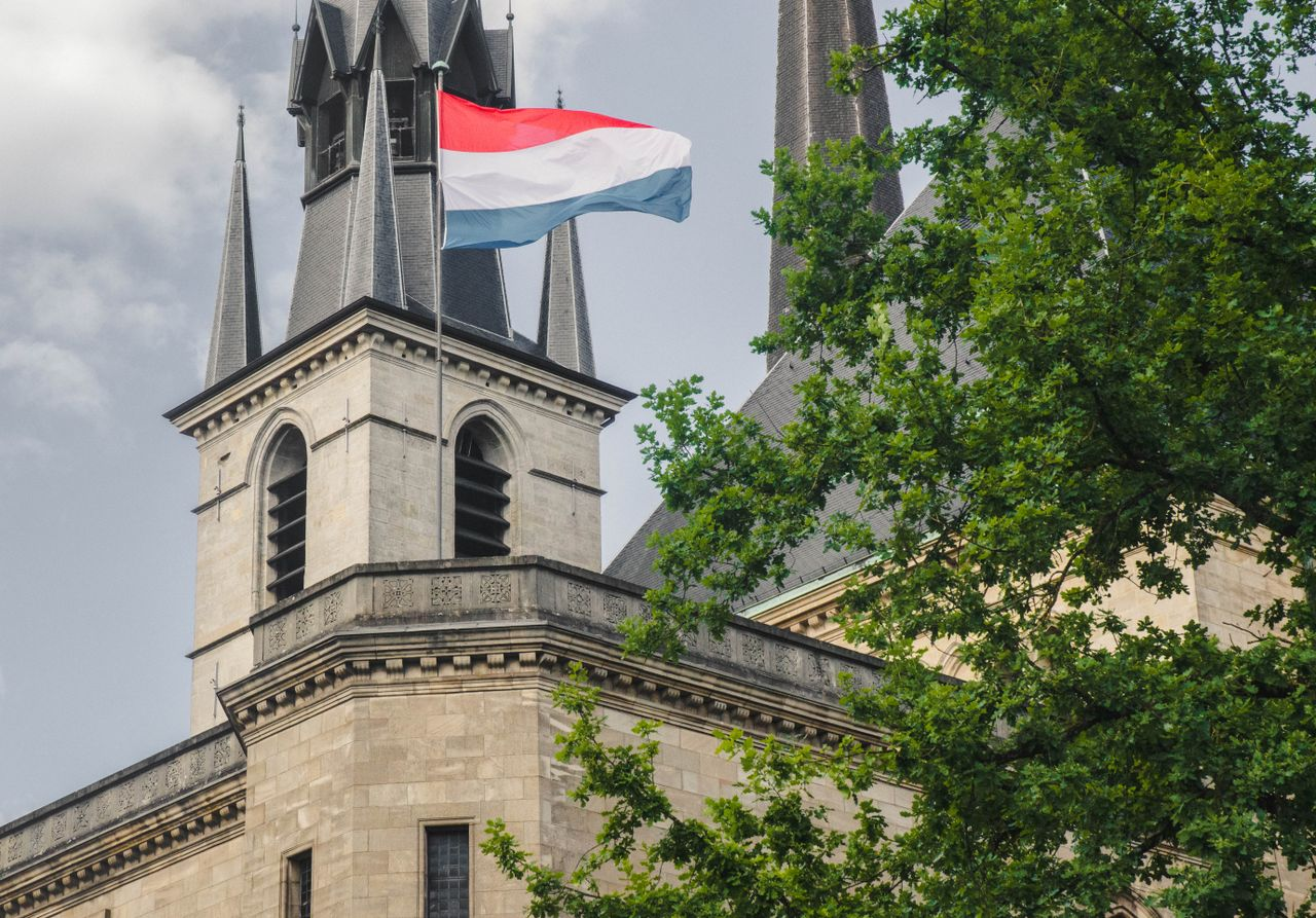 A church in Luxembourg with the national flag