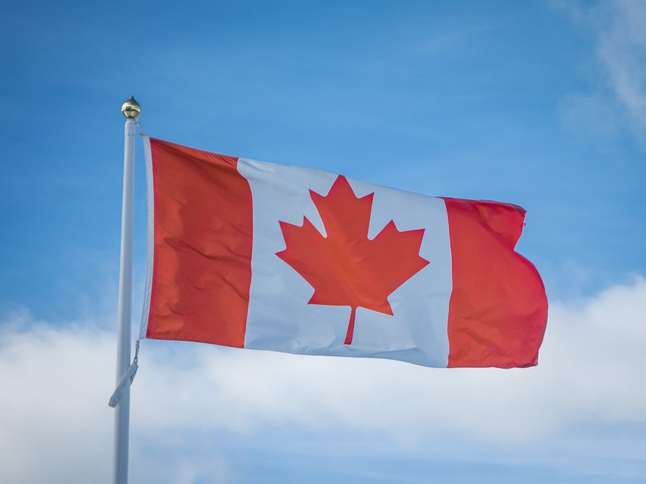Canadian flag waving in the breeze