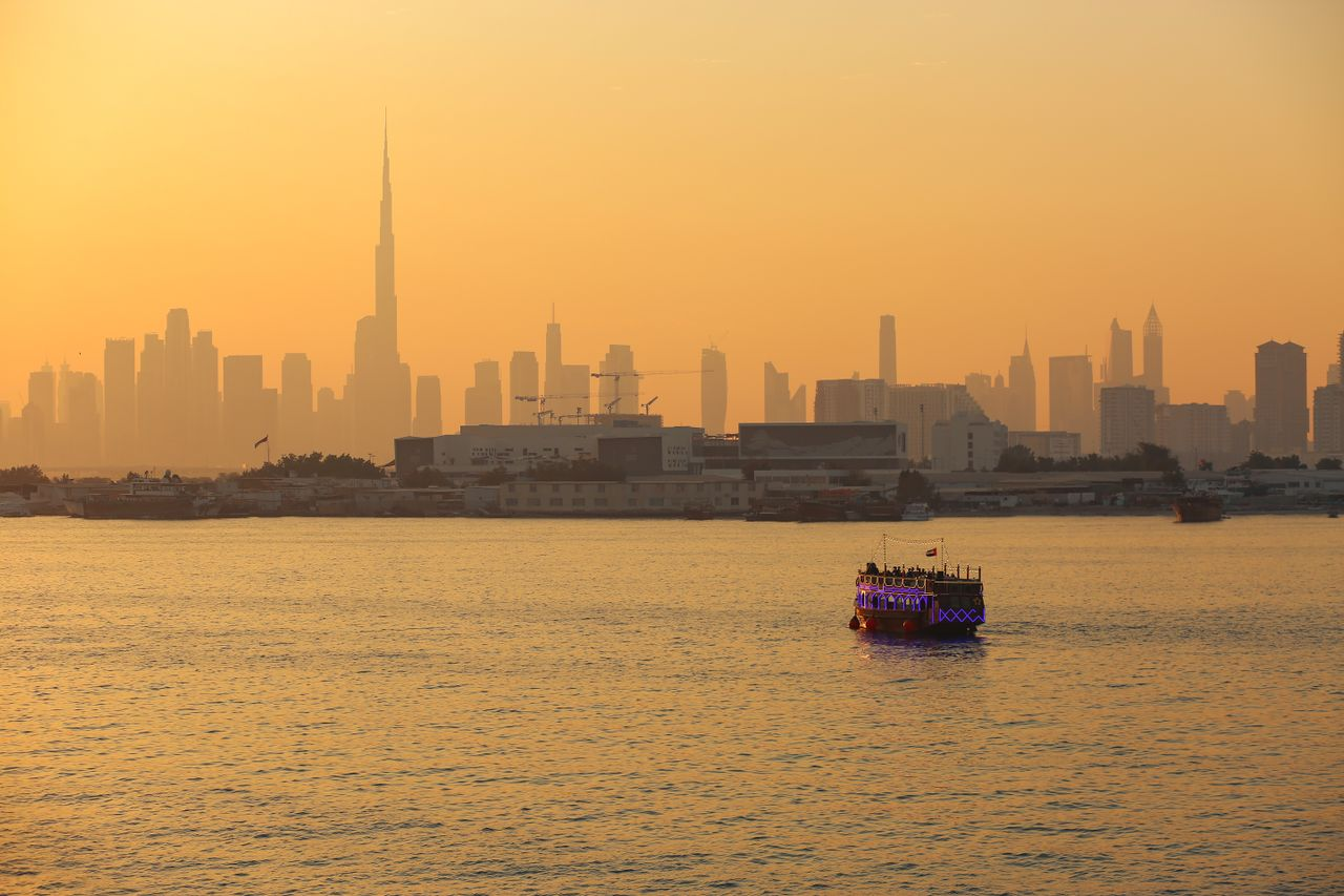 Dubai skyline with Burj Khalifa during sunset