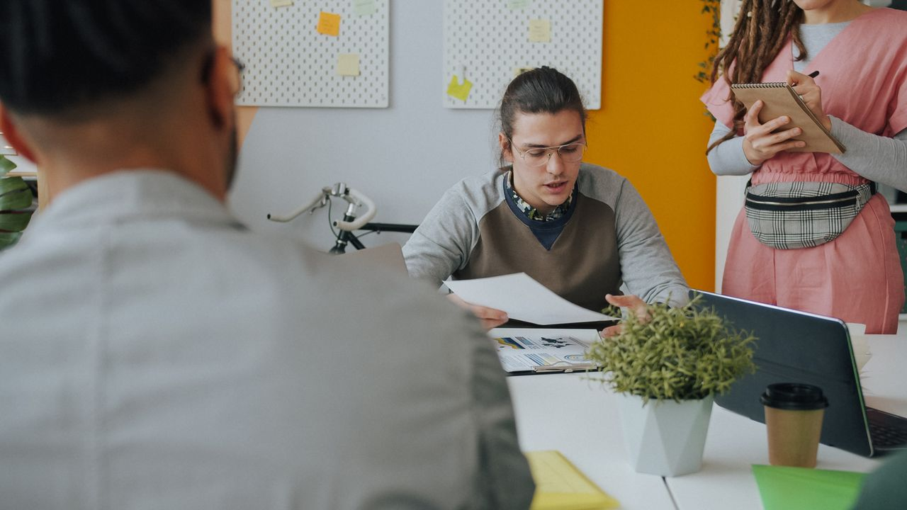 Young professionals engaged in a discussion